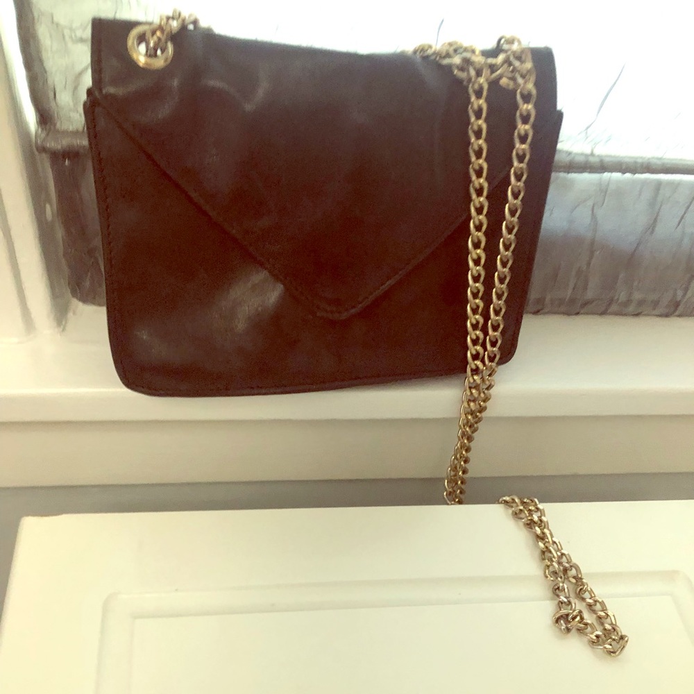small black leather crossbody purse silver chain.